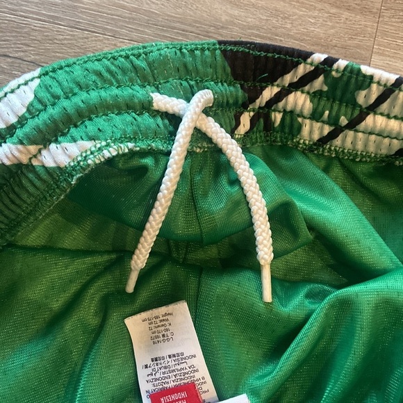 Mitchell & Ness Kelly Green Boston Celtics Hardwood Classics Big Face Shorts - Picture 9 of 9